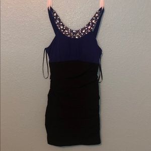 Black and blue form fitting dress
